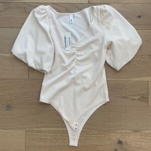 NWT Soft Cream V-Neck Bodysuit